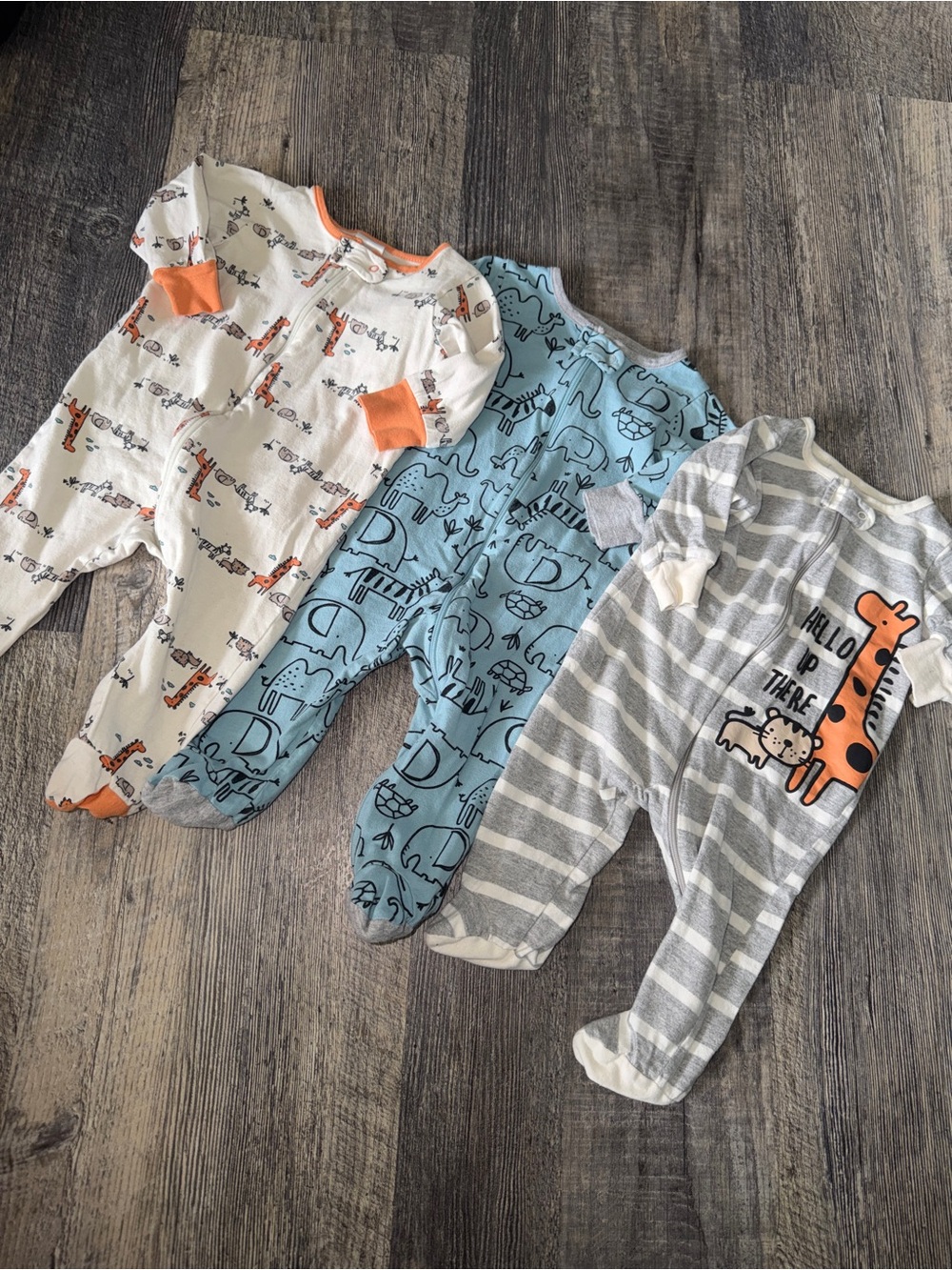 Gerber 3-Pack Baby Footed One-Pieces in Orange, Blue, Gray